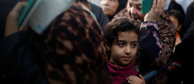 refugees fleeing - by Mohammed Salem